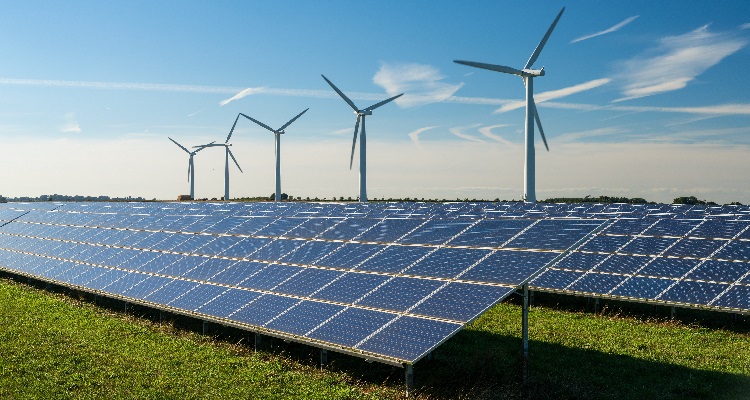 picture of solar panels and wind turbines