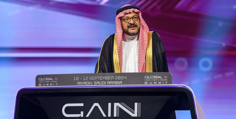 Aramco official addressing a conference