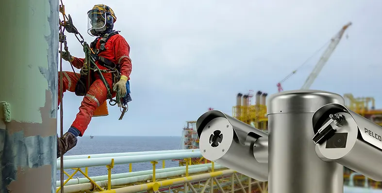 security_camera_on_oil_rig_with_oil_worker