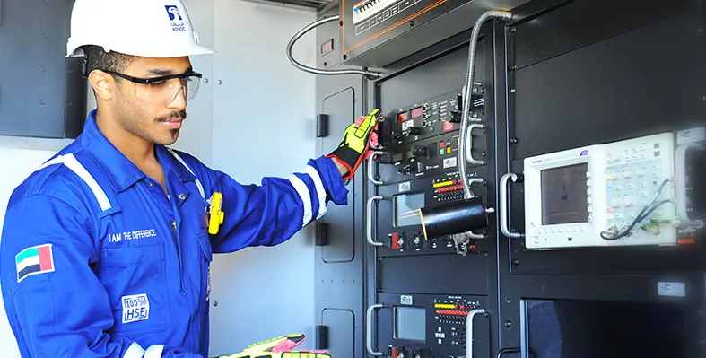 engineer_next_to_instrument_panel