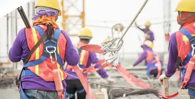 Construction workers in hard hats