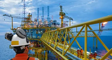 offshore_oil_rig_with_worker_in_foreground