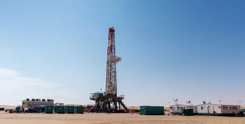 Both onshore and offshore operations, and oilfield services did well. (Image source: Adnoc Drilling) oil rigs