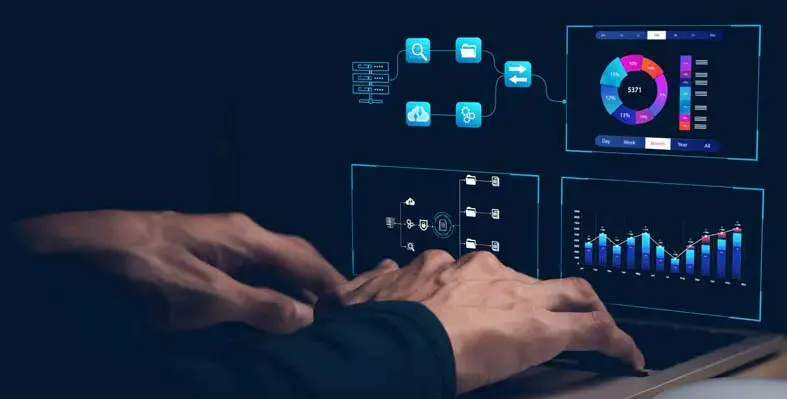 man in front of computer showing data