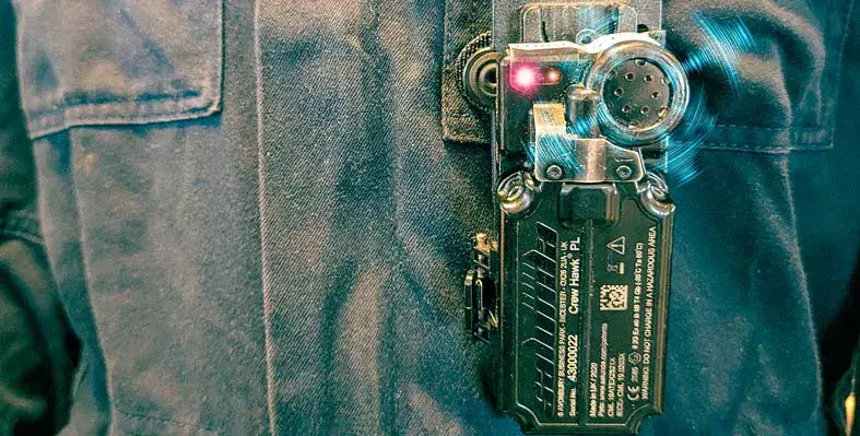 PIcture of a worker wearing monitoring device