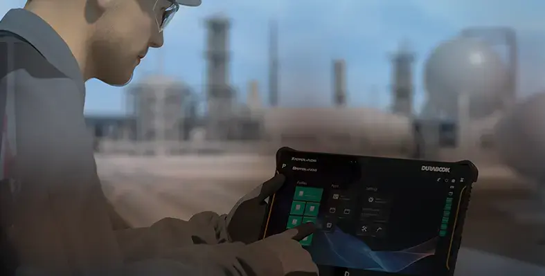 The tablet is suitable for use in demanding and hazardous applications. (Image source: Pepperl+Fuchs) Picture of man using a tablet