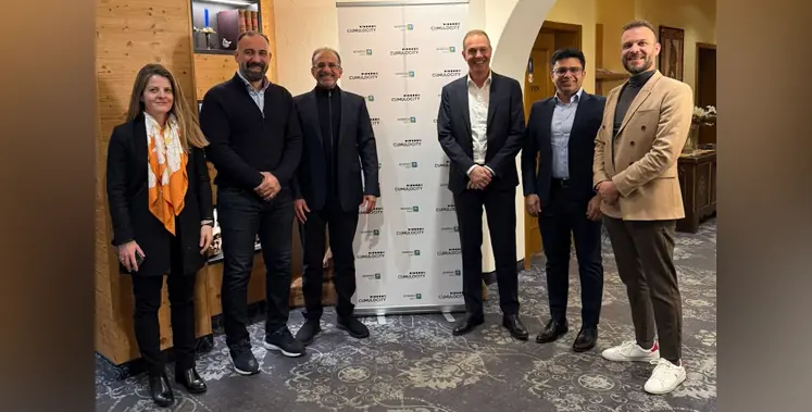 Cumulocity_and_Aramco_Digital_personnel_with_banner