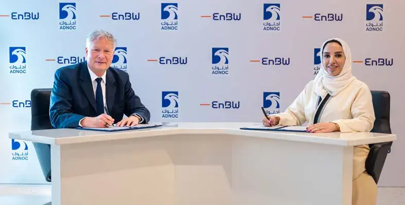 The agreement signing. (Image source: ADNOC) Picture of a contract signing