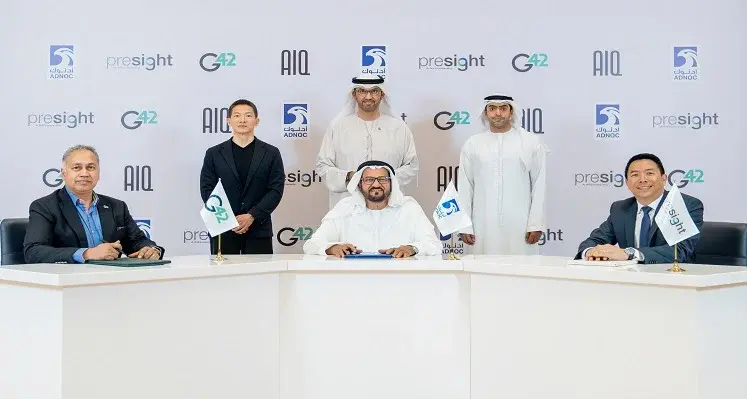 The transaction will result in the combination of AIQ's breakthrough AI energy solutions with Presight's cross-sector big data analytics, product development, and international markets access. (Image source: ADNOC/AIQ/Presight) AIQ signing ceremony