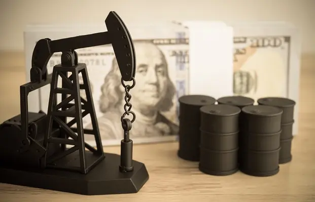 The United States heads into the new year producing more oil than any country in history. (Image source: Adobe Stock)