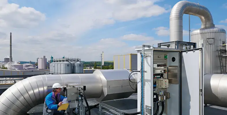 Endress+Hauser is now exclusively marketing SICK’s gas analysis and flow measurement technology worldwide. (Image source: Endress+Hauser) A man measuring gas