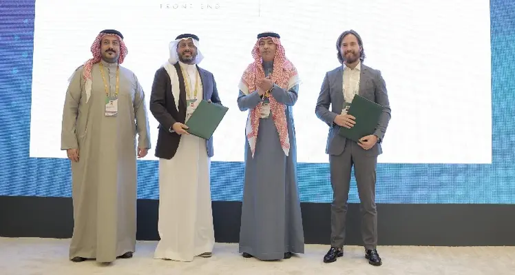 The agreement signing. (Image source: Front End) Picture of four men at agreement signing