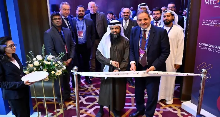 Group of men at ribbon-cutting ceremony
