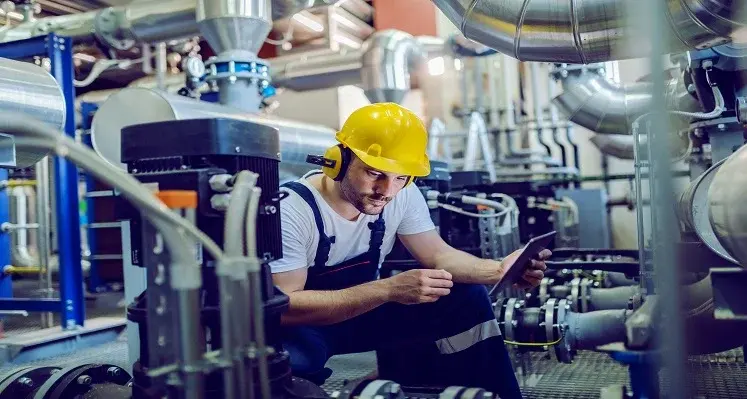 Picture of man operating machinery