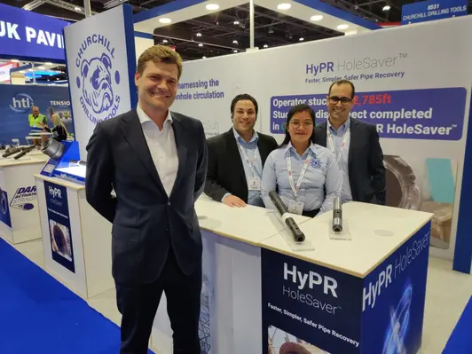 Nicholas Kjaer foreground General Manager Middle East and Asia with the Churchill ADIPEC team 1