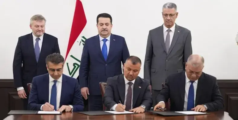 Six_men_at bp_and_Iraq_contract_signing