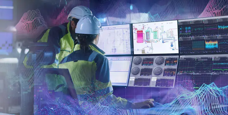 The report provides expert insights to help oil and gas professionals navigate digital transformation with confidence. (Image source: DataPARC) Woman_and_man_in_hard_hats_looking_at analytics_screen