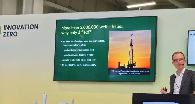 Picture of a man presenting at conference