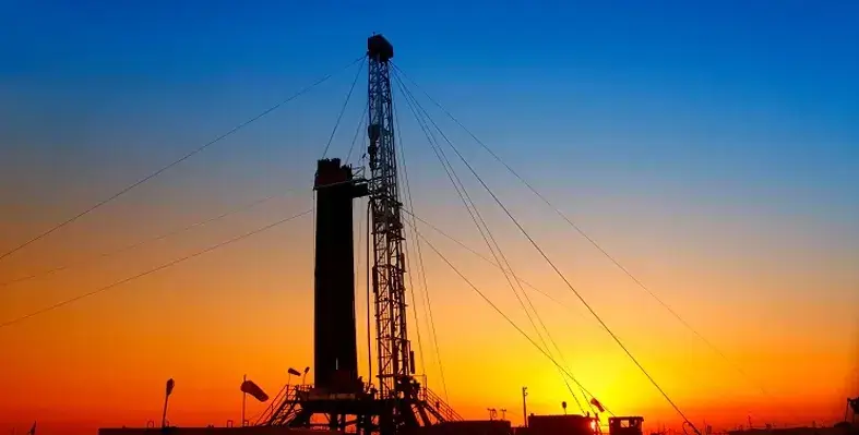 The Middle East continues to develop its fossil fuels, along with renewables. (Image source: Adobe Stock) oil_rig_at_sunset